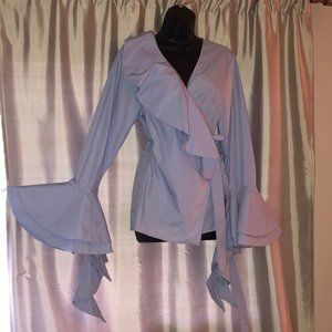 Crossover blouse with ornate sleeves